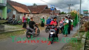 GP Ansor Sariwangi Bagikan Takjil dan Masker kepada Pengguna Jalan