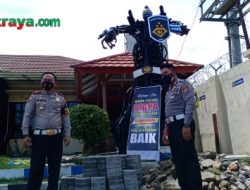 Unik ! Polres Tasikmalaya Buat Monumen Robot Transformer dari Knalpot Bising 
